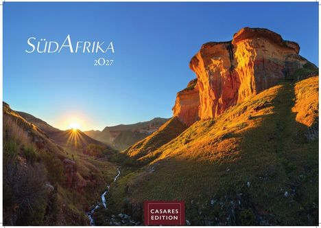Text: "SÜDAFRIKA 2027", "CASARES EDITION". Ein Sonnenaufgang beleuchtet eine felsige Landschaft in warmen Farben.