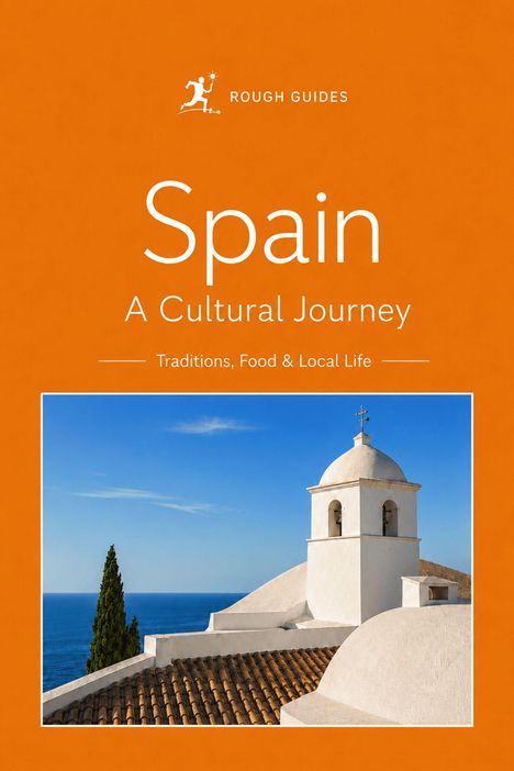 „Spain, A Cultural Journey: Traditions, Food & Local Life.“ Ein weißer Glockenturm mit Meerblick und blauem Himmel.
