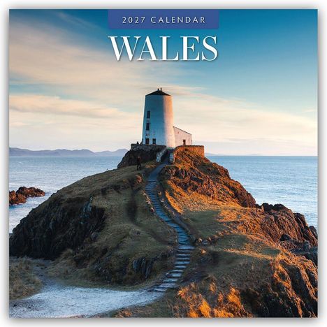 „2027 Calendar - Wales“ steht oben. Küste mit einem natürlichen Felsbogen, umgeben von türkisem Wasser.