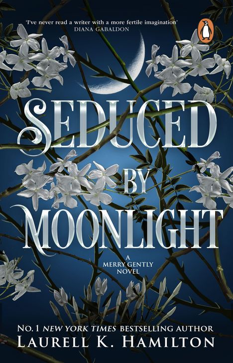 "Seduced by Moonlight, A Merry Gentry Novel" von Laurell K. Hamilton. Blüten und Zweige vor einem blauen Hintergrund.