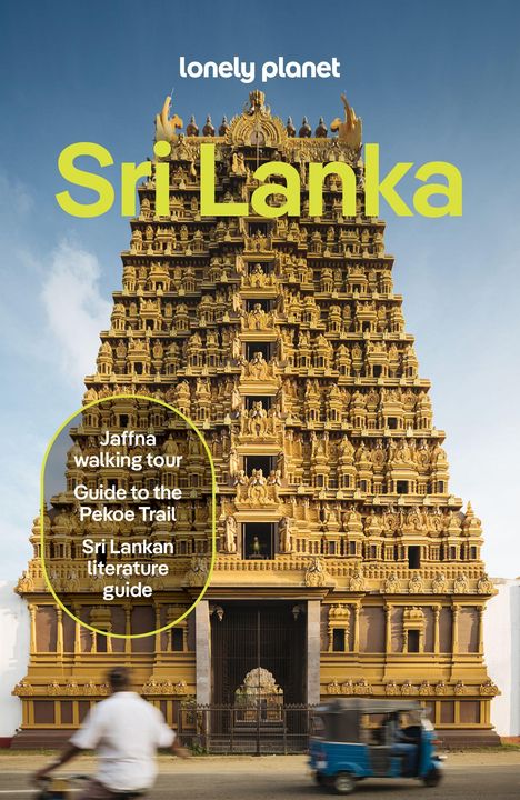 Geflockte Texte: "Jaffna walking tour", "Guide to the Pekoe Trail", "Sri Lankan literature guide". Gelber Tempel im Hintergrund.