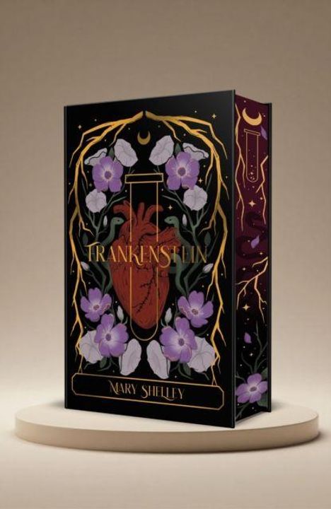 „Frankenstein“, „Mary Shelley“. Illustration: Anatomisches Herz, umgeben von lilafarbenen Blumen und goldenen Ästen.