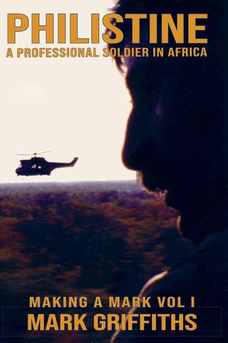 "PHILISTINE A PROFESSIONAL SOLDIER IN AFRICA" und "MAKING A MARK VOL I MARK GRIFFITHS" in Großbuchstaben. Profil eines Mannes vor einem Helikopter.