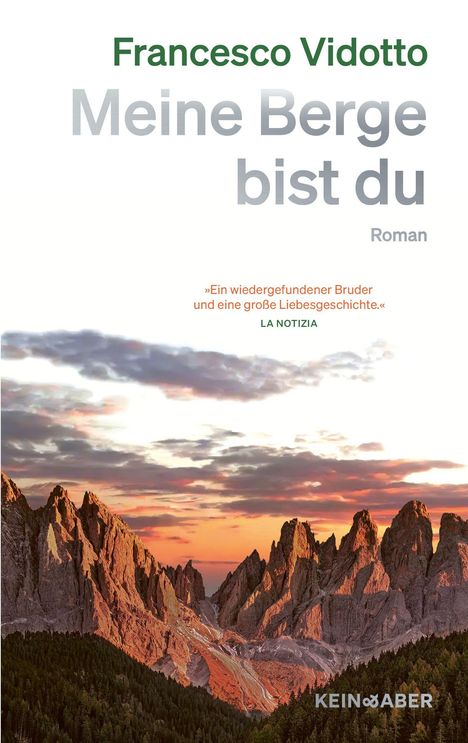 Titel: "Meine Berge bist du" von Francesco Vidotto. Zitat von La Notizia. Bild: Dramatische Berge im Sonnenuntergang.