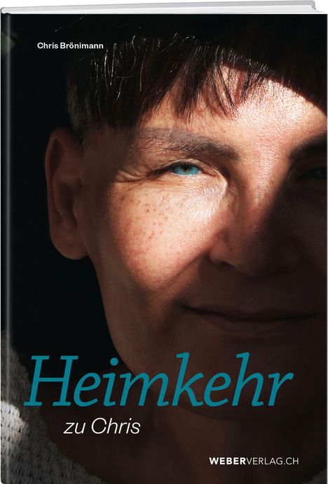 "Heimkehr zu Chris", Chris Brönimann. Ein Gesicht zur Hälfte im Schatten, mit sichtbarem blauem Auge.