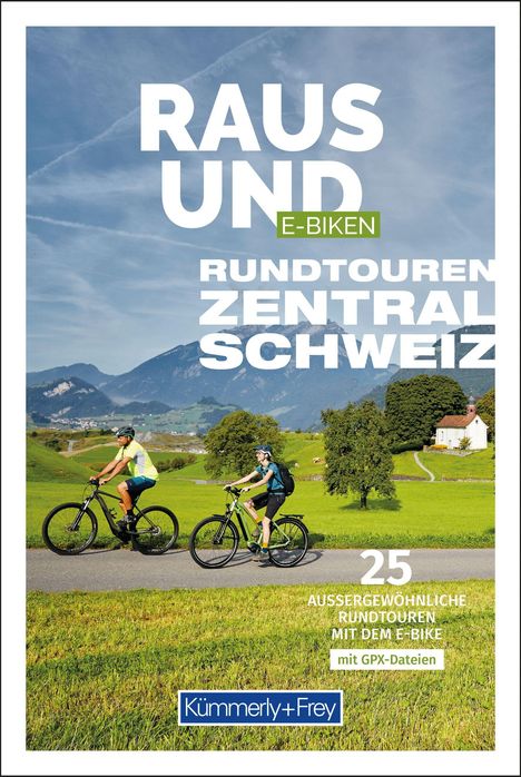 "Raus und E-Biken" text; 2 Radfahrer; Bergkulisse; grüne Wiesen; Kirche; "Kümmerly+Frey" Logo.