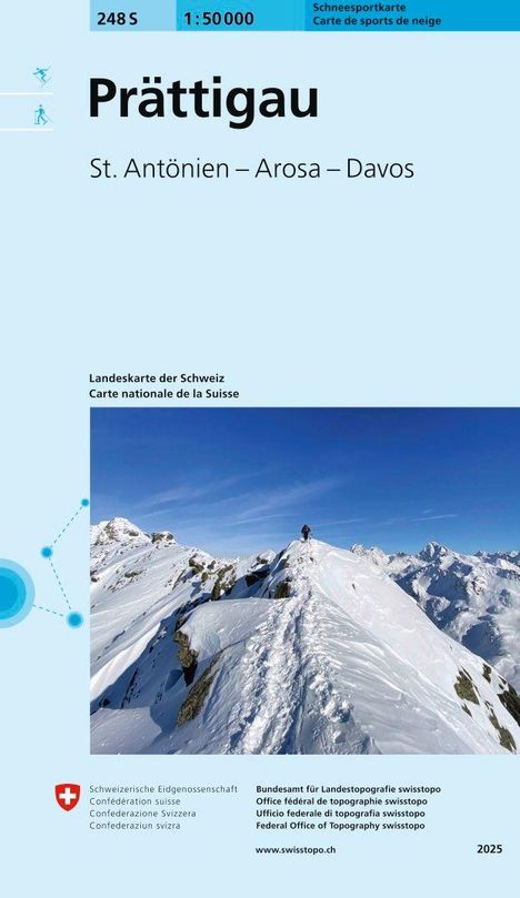 Prättigau. St. Antönien – Arosa – Davos. Schneesportkarte. Schnee bedeckte Berglandschaft unter blauem Himmel.