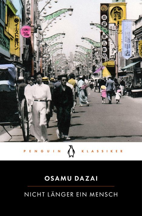 "Osamu Dazai - Nicht länger ein Mensch. Penguin Klassiker." Vintage Straßenszene in Japan mit Menschen und Geschäften.