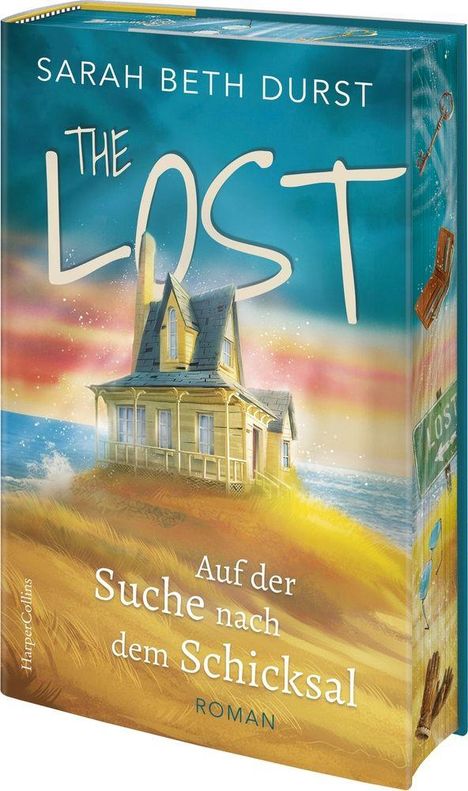 „The Lost. Auf der Suche nach dem Schicksal. Roman.“ zeigt ein Haus am Meer mit stürmischen Wellen und einer Straße.