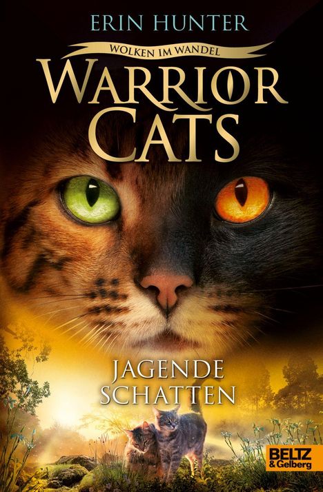 "ERIN HUNTER, WOLKEN IM WANDEL, WARRIOR CATS, JAGENDE SCHATTEN." Eine Katze mit zwei unterschiedlich farbigen Augen.
