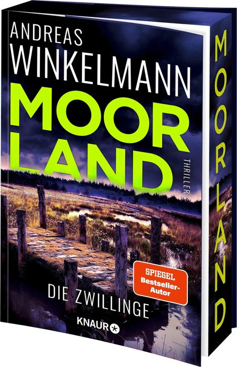 Text: "Andreas Winkelmann, Moorland, Die Zwillinge, SPIEGEL Bestseller-Autor, Thriller." Ein düsterer Holzweg im Moor.