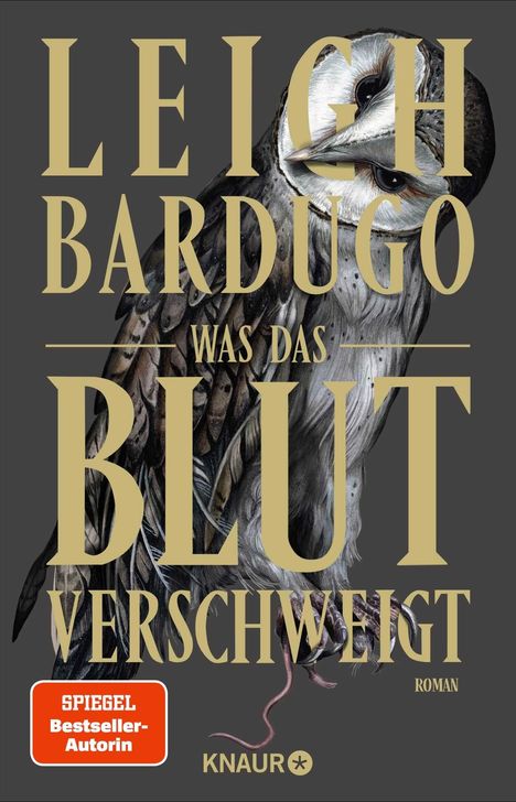 Text: "LEIGH BARDUGO WAS DAS BLUT VERSCHWEIGT ROMAN KNAUR". Illustration einer Eule auf dunklem Hintergrund.