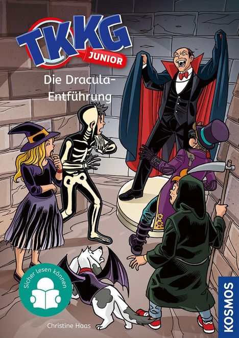 TTKKG Junior, Die Dracula-Entführung. Vier Kinder in Kostümen und ein Hund begegnen Dracula auf einem Sockel.