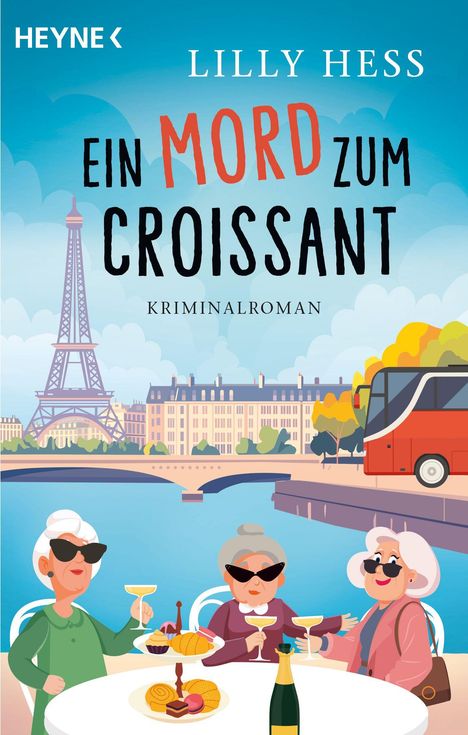 Oben steht „Lilly Hess: Ein Mord zum Croissant, Kriminalroman“. Drei Frauen sitzen mit Wein und Gebäck an einem Tisch.