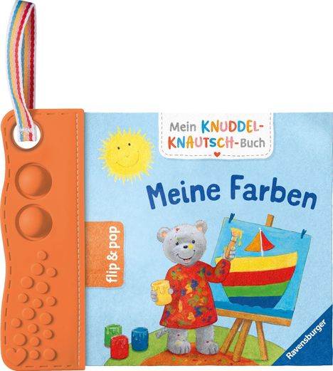 Text: „Mein Knuddel-Knautsch-Buch, Meine Farben, flip & pop“. Illustration: Ein Bär malt ein farbiges Boot.