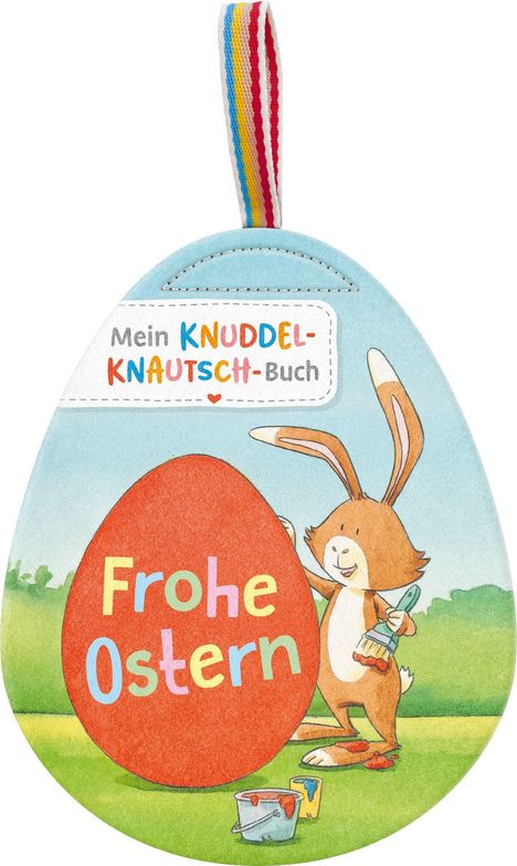 „Frohe Ostern“, „Mein Knuddel-Knautsch-Buch“. Illustration: Hase bemalt ein Osterei, bunte Wiese, gestreiftes Band oben.