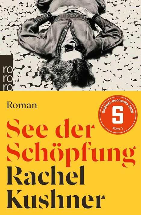 Text: "Roman", "See der Schöpfung", "Rachel Kushner", "SPIEGEL Buchpreis 2025 Platz 1". Illustration: Frau liegt auf steinigem Boden.