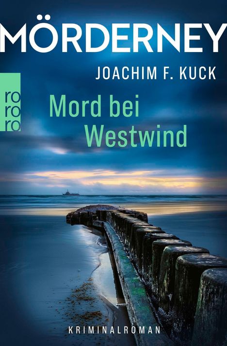 Text: "Mörderney", "Joachim F. Kuck", "Mord bei Westwind", "Kriminalroman". Strand mit Buhne im Meer.