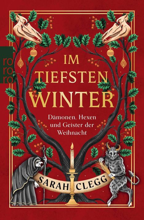 „IM TIEFSTEN WINTER. Dämonen, Hexen und Geister der Weihnacht. Sarah Clegg.“ Zwei Totenköpfe, Zweige, Kerze.