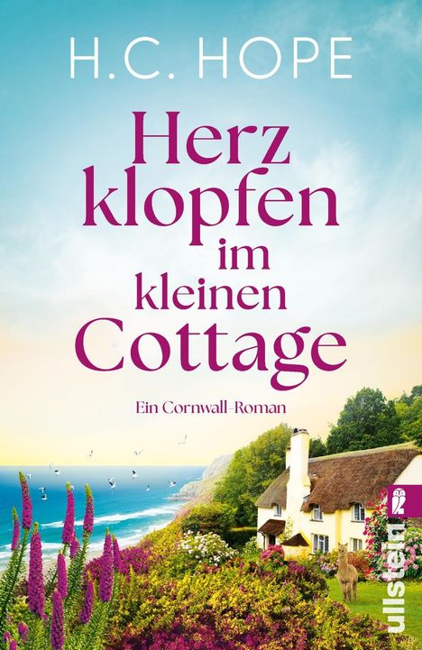Text: "H. C. Hope. Herzklopfen im kleinen Cottage. Ein Cornwall-Roman." Landschaft mit Küste, Cottage, Blumen und einem Alpaka.
