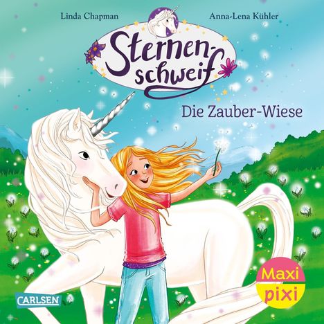 „Sternenschweif - Die Zauber-Wiese.“ Ein Mädchen mit rotem Shirt umarmt ein Einhorn auf einer blühenden Wiese.