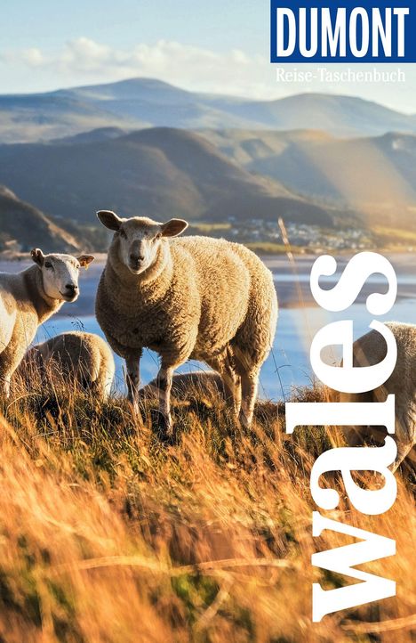 Text oben: "DUMONT Reise-Taschenbuch". Unten: "wales". Zwei Schafe auf einer Wiese, Berge im Hintergrund.