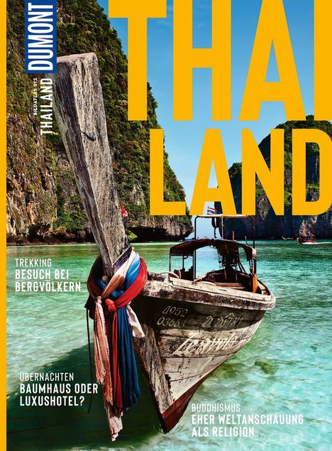 Titel: "THAILAND". Themen: Trekking, Übernachten, Buddhismus. Ein traditionelles Boot auf türkisfarbenem Wasser, umgeben von Felsen.