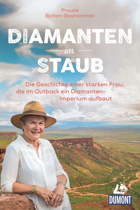 Text: "Frauke Bolten-Boshammer, Diamanten im Staub, Die Geschichte einer starken Frau, die im Outback ein Diamanten-Imperium aufbaut." Unten ist ein lächelndes ältere Frau mit Hut vor einer Outback-Landschaft und das Dumont-Logo.