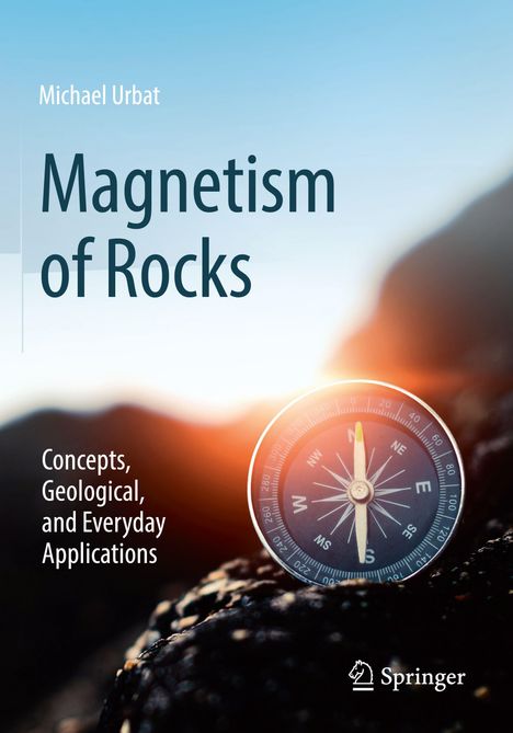 "Magnetism of Rocks" von Michael Urbat. Thema: Konzepte und Anwendungen. Im Vordergrund ein Kompass auf einem Felsen.