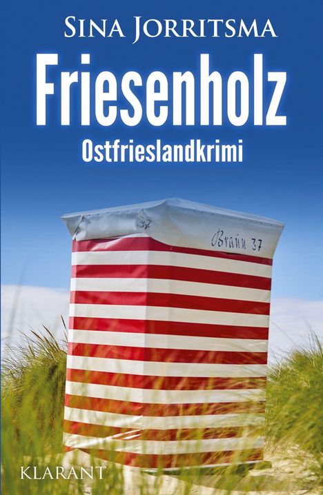 „Friesenholz, Ostfrieslandkrimi.“ Ein rot-weiß gestreifter Strandkorb steht in einer Dünenlandschaft.