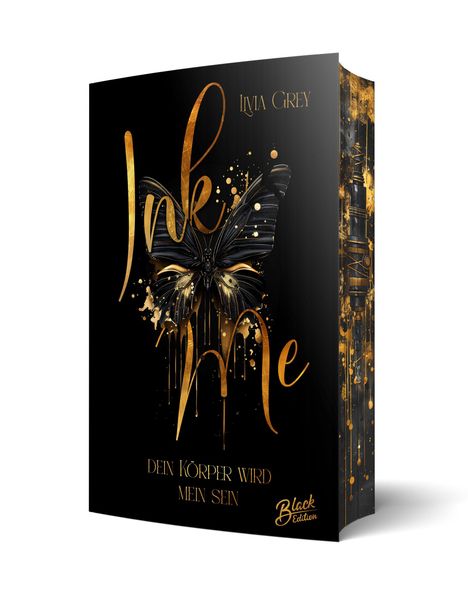"Ink Me" von Livia Grey. Text: "DEIN KÖRPER WIRD MEIN SEIN". Schwarzes Cover mit goldener Schrift und Schmetterling.