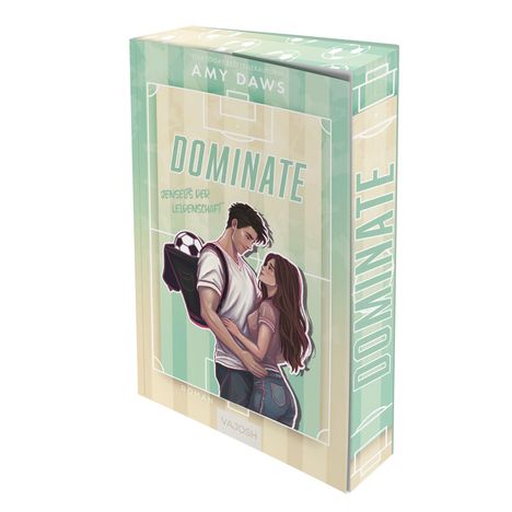 Text: "DOMINATE", "Jenseits der Leidenschaft", "Amy Daws". Illustration: Ein Paar steht eng umarmt mit einem Fußball.