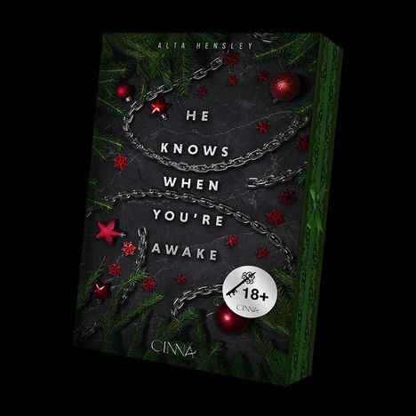 Text: "HE KNOWS WHEN YOU'RE AWAKE". Cover mit Ketten, Tannenzweigen, roten Sternen und Schneeflocken; Weihnachtliche Elemente.