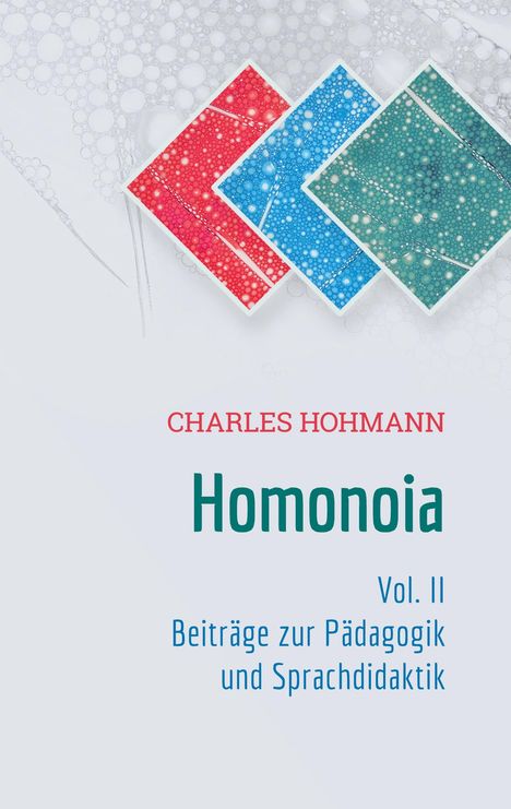 Text: CHARLES HOHMANN, Homonoia, Vol. II, Beiträge zur Pädagogik und Sprachdidaktik. Hintergrund: Bunte geometrische Muster.