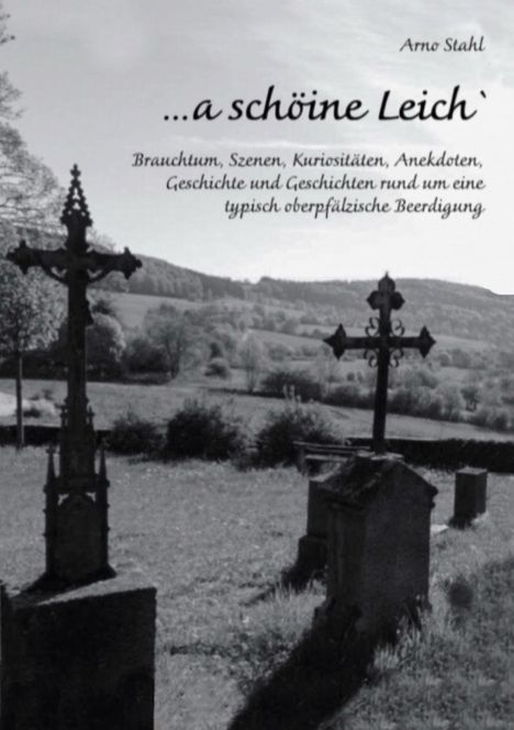 Text: „...a schöine Leich`“ von Arno Stahl. Dazu Grabkreuze auf einer Wiese, im Hintergrund eine Hügellandschaft.