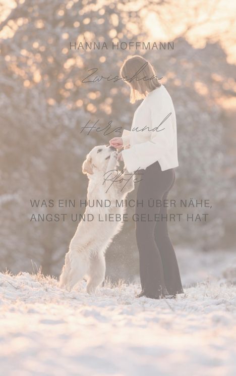 Text: "HANNA HOFFMANN Zwischen Herz und Pfote. WAS EIN HUND MICH ÜBER NÄHE, ANGST UND LIEBE GELEHRT HAT". Hund und Mensch im Schnee.