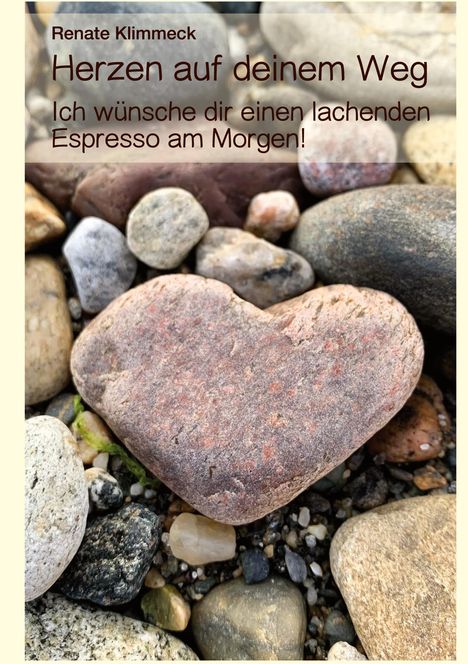 Text: "Herzen auf deinem Weg. Ich wünsche dir einen lachenden Espresso am Morgen!" Herzförmiger Stein auf Kiesel.
