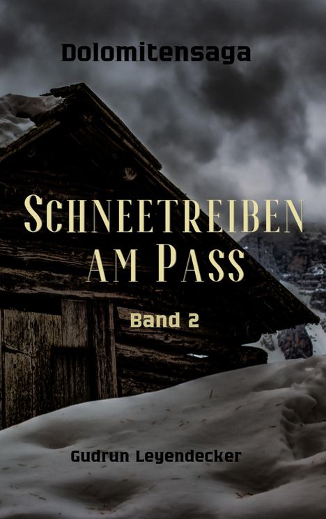 Text: "Dolomitensaga", "SCHNEETREIBEN AM PASS", "Band 2", "Gudrun Leyendecker". Dunkler Himmel, verschneite Hütte.