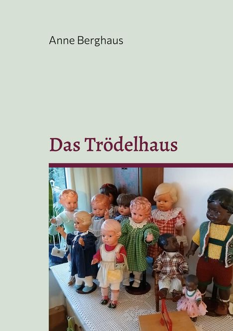 "Anne Berghaus", "Das Trödelhaus". Eine Gruppe von Puppen in farbiger Kleidung auf einem Tisch.