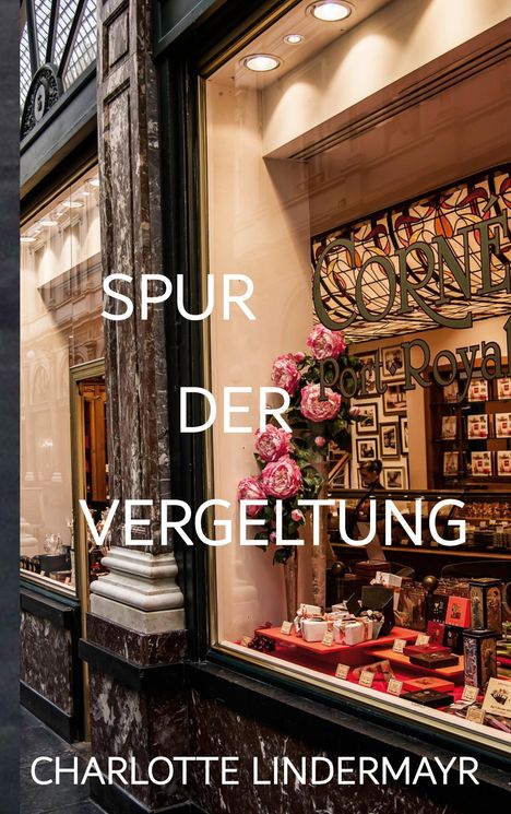 Ein elegantes Schaufenster mit dem Titel „SPUR DER VERGELTUNG“ von Charlotte Lindermayr, dekoriert mit Blumen.