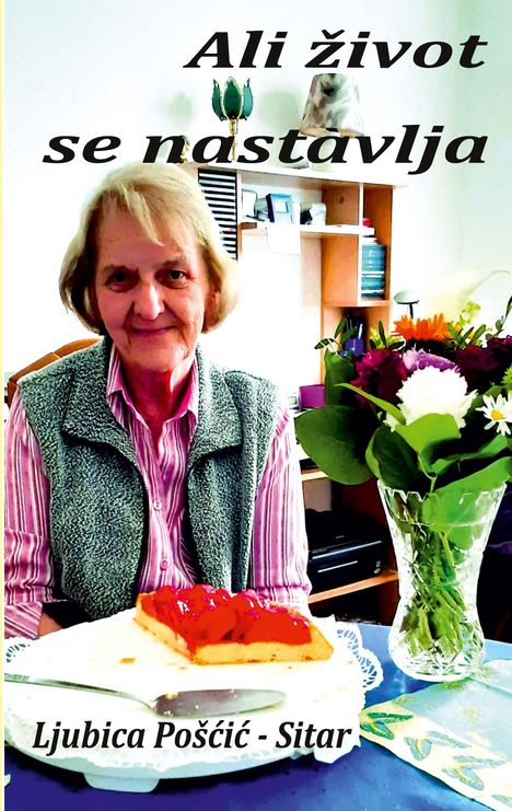 "Ali život se nastavlja. Ljubica Pošćić - Sitar." Eine ältere Frau sitzt vor einer Torte und einem Blumenstrauß.