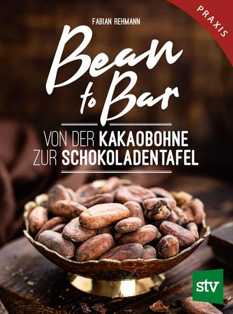 Text: "FABIAN REHMANN", "Bean to Bar", "VON DER KAKAOHBOHNE ZUR SCHOKOLADENTAFEL". Ein Schälchen mit Kakaobohnen.