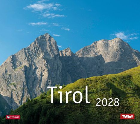 "Tirol 2028". Im Hintergrund steile Berge, im Vordergrund grüne Hügel. Zwei Logos unten: eins von Tyrolia, eins von Tirol.