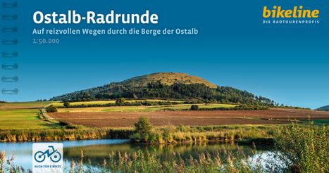 "Ostalb-Radrunde" und "bikeline" Texte. Landschaft mit Hügeln, Feldern und einem See. Logo: Fahrrad, Hinweis auf E-Bikes.