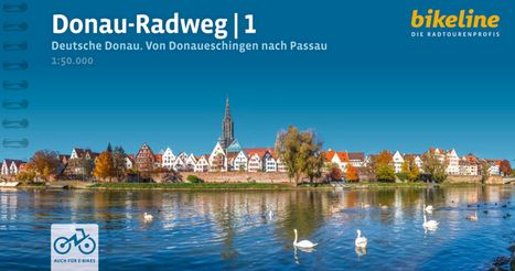 "Donau-Radweg 1. Deutsche Donau. Von Donaueschingen nach Passau." Stadtansicht am Fluss, Schwäne, blauer Himmel.