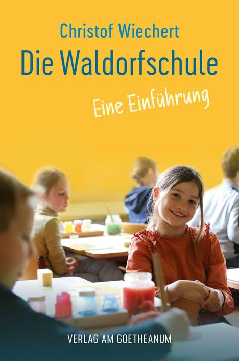 Text: "Christof Wiechert Die Waldorfschule Eine Einführung VERLAG AM GOETHEANUM". Ein Mädchen lächelt im Klassenzimmer.