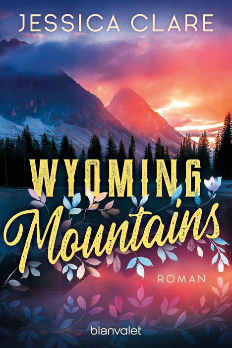 Text: "Jessica Clare", "Wyoming Mountains", "Roman", "blanvalet". Sonnenuntergang hinter Bergsilhouette und Bäumen.