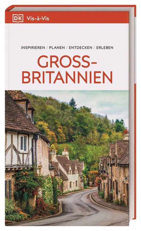 GROSSBRITANNIEN. Inspirieren, Planen, Entdecken, Erleben. Häuserreihe mit üppiger Vegetation entlang einer kurvigen Straße.