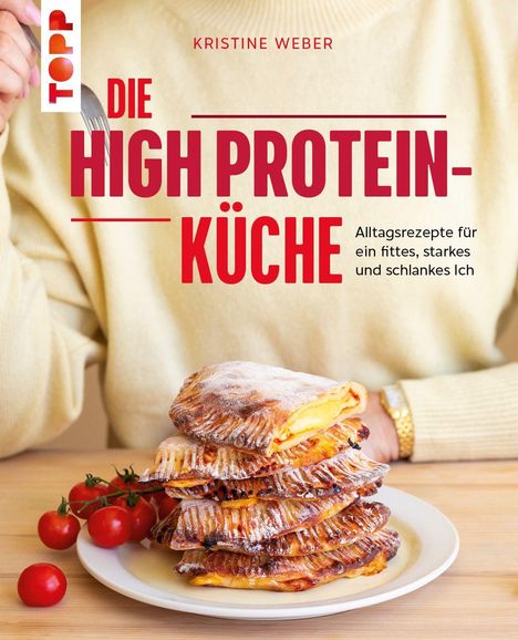 Text: Die High Protein-Küche. Alltagsrezepte für ein fittes, starkes und schlankes Ich. Stapel Blätterteig mit Tomaten.