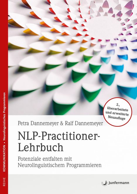 „NLP-Practitioner-Lehrbuch“ von Petra & Ralf Dannemeyer, 2. Auflage, farbenfrohes, spiralförmiges Design.
